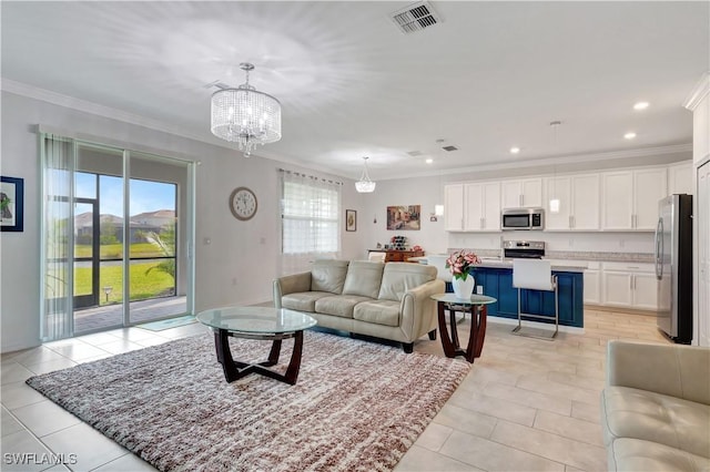 living room with a chandelier, ornamental molding, and light tile patterned flooring