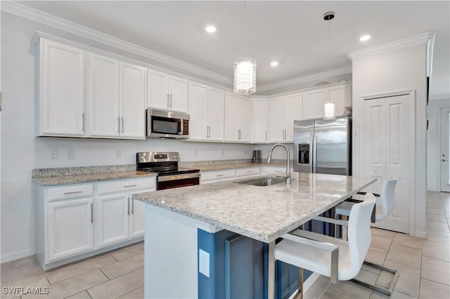 2122 Hamlin St, Naples, FL 34120 - kitchen featuring appliances with stainless steel finishes, light tile patterned flooring, white cabinetry, ornamental molding, and recessed lighting