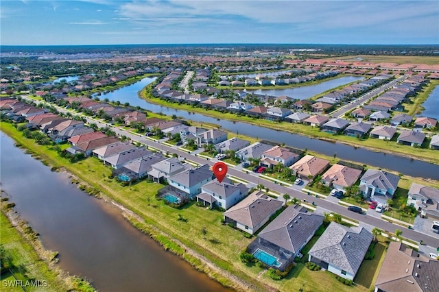 drone / aerial view with a water view