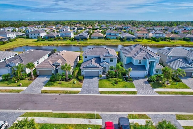 bird's eye view with a water view