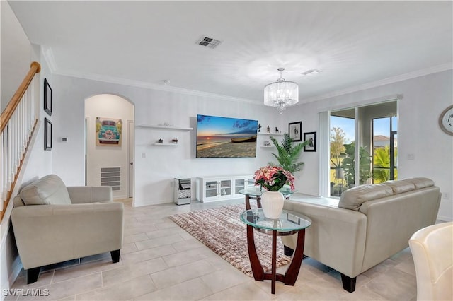 2122 Hamlin St, Naples, FL 34120 - living area with stairway, a chandelier, arched walkways, and crown molding