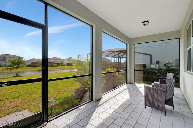 2122 Hamlin St, Naples, FL 34120 - sunroom featuring a water view