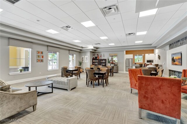 2122 Hamlin St, Naples, FL 34120 - living area with light carpet and plenty of natural light