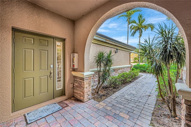 entrance to property with covered porch