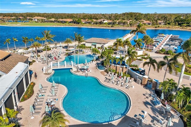 view of swimming pool with a water view