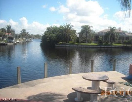 dock area featuring a water view