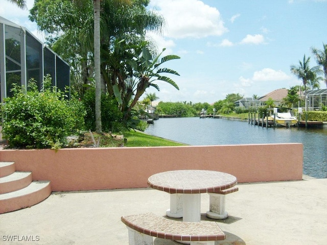 view of patio / terrace featuring a water view