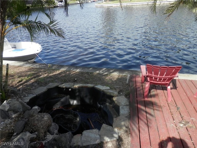 dock area featuring a water view