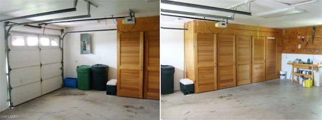 garage with electric panel and a garage door opener