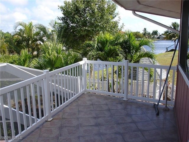 balcony featuring a water view