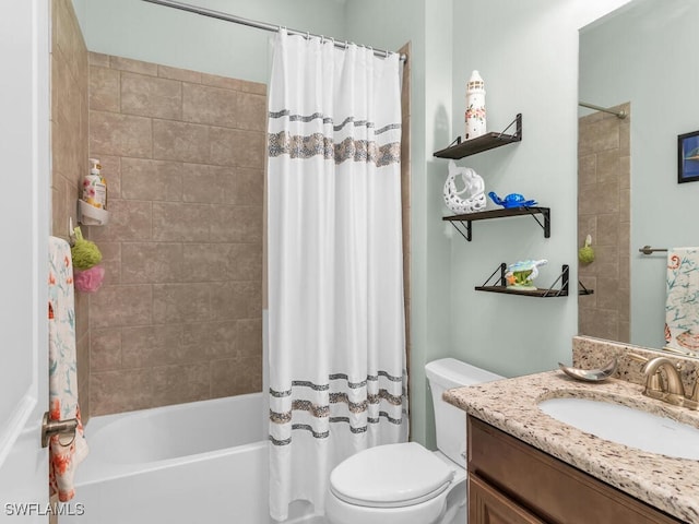 full bathroom featuring vanity, toilet, and shower / tub combo with curtain