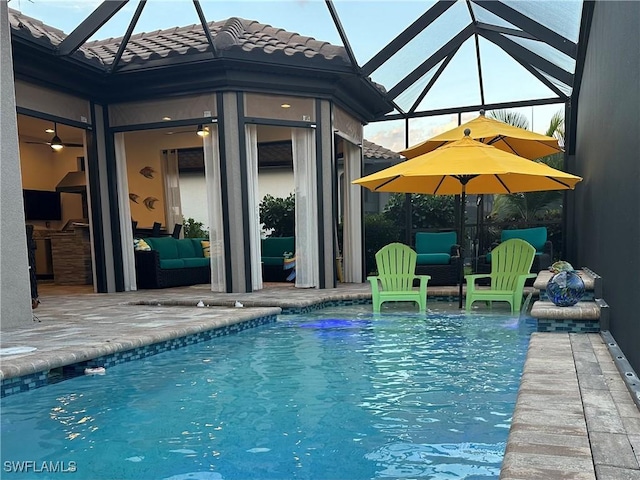 8524 Sevilla Ct, Naples, FL 34114 - outdoor pool with an outdoor living space, a patio, glass enclosure, and ceiling fan
