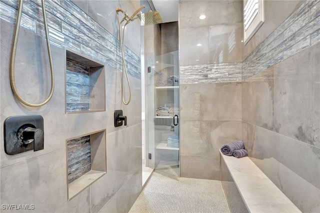 bathroom featuring an enclosed shower