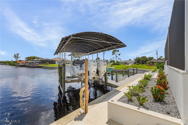 view of dock with a water view