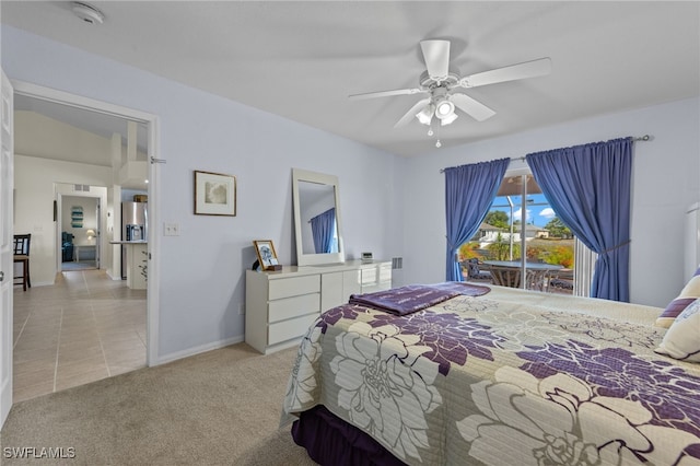 bedroom featuring light carpet, access to exterior, and ceiling fan