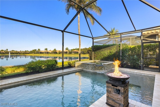 view of pool featuring a lanai, an in ground hot tub, a water view, and a fire pit