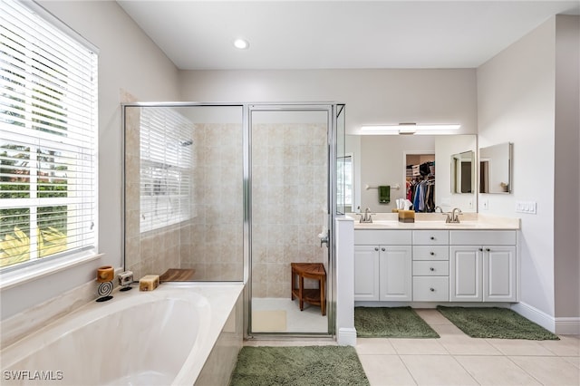 bathroom featuring separate shower and tub, tile patterned flooring, and vanity