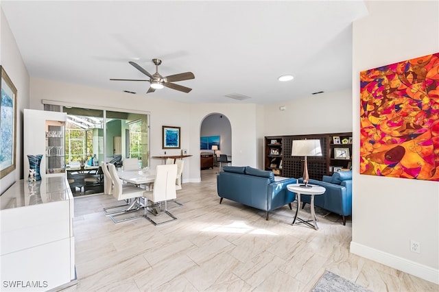 living room with ceiling fan