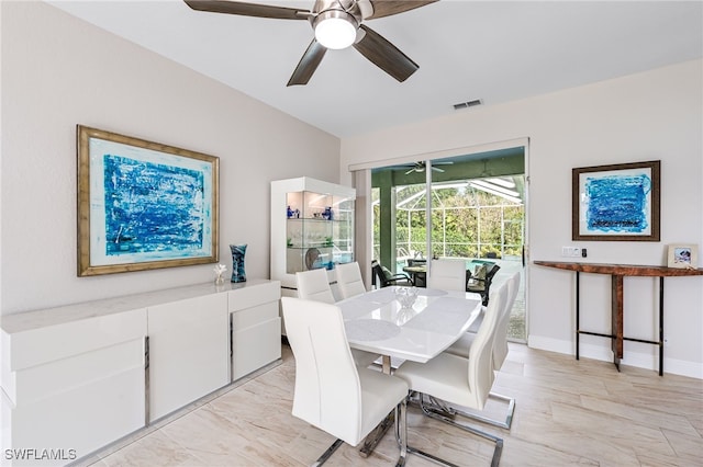 dining space with ceiling fan