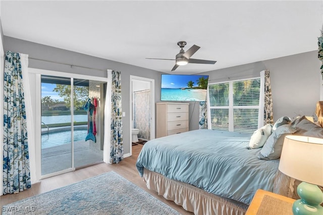 bedroom with ceiling fan, access to exterior, light wood-type flooring, and connected bathroom