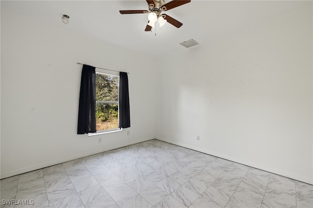 empty room featuring ceiling fan