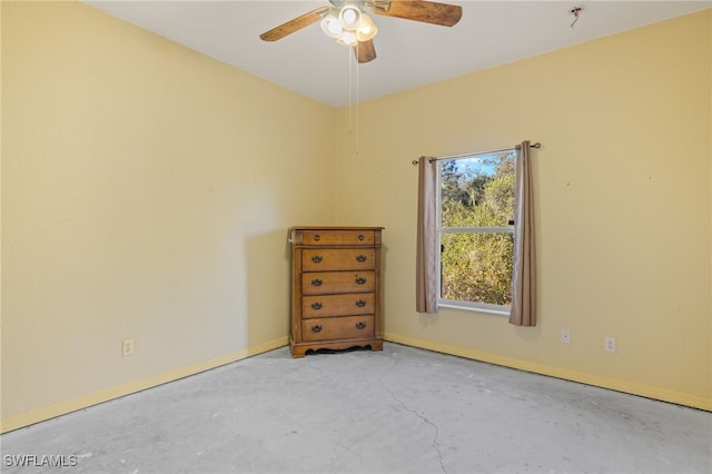 unfurnished room featuring ceiling fan