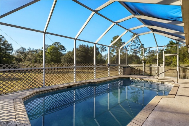 view of pool featuring a lanai