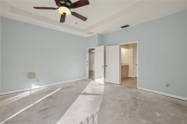 unfurnished bedroom with connected bathroom and ceiling fan