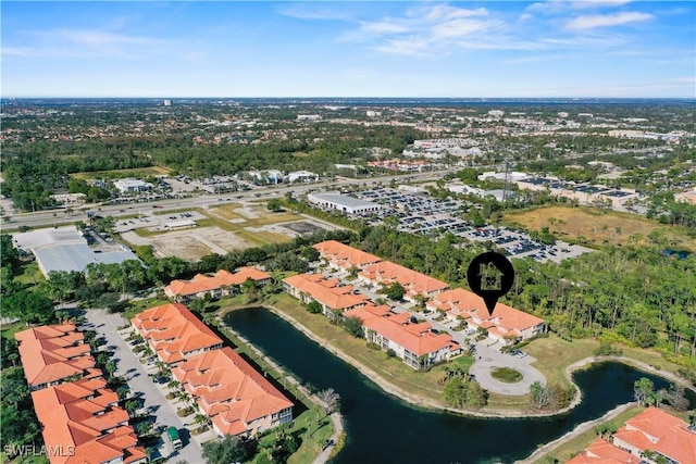 bird's eye view with a water view and a residential view