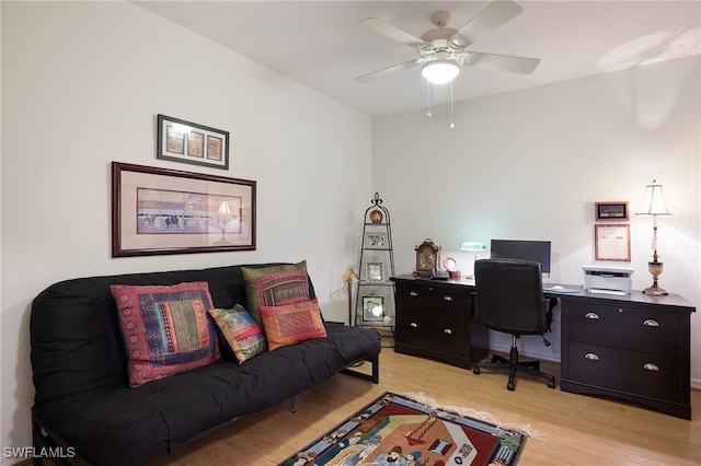 office space featuring ceiling fan and light hardwood / wood-style flooring