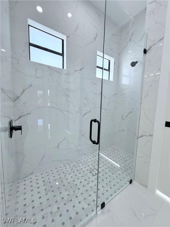 bathroom featuring walk in shower