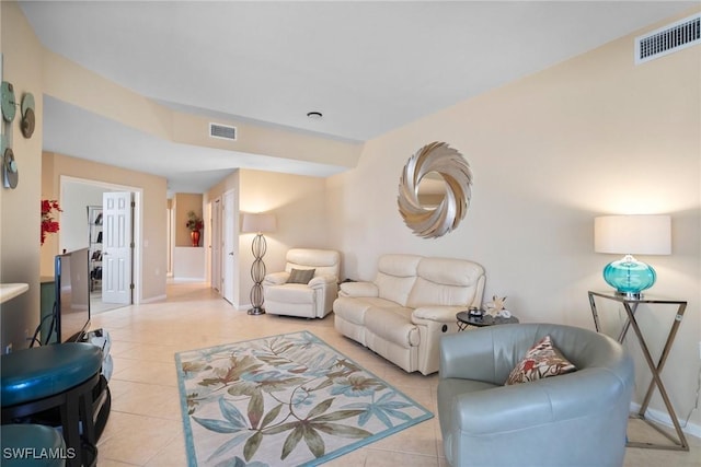 living room with light tile patterned floors