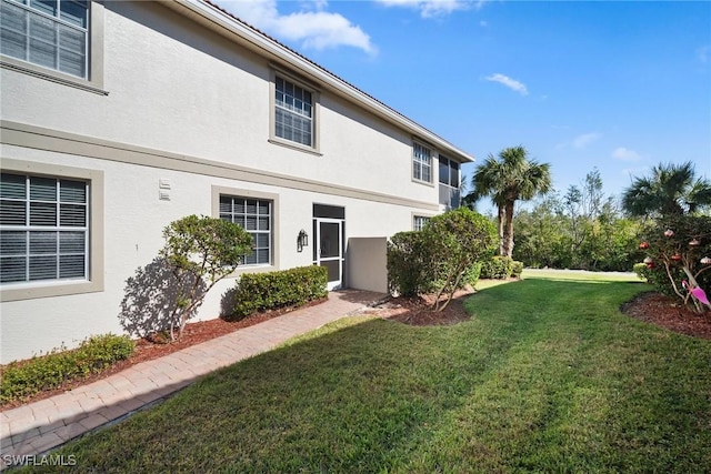 exterior space featuring a lawn