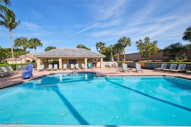 view of swimming pool featuring a patio area