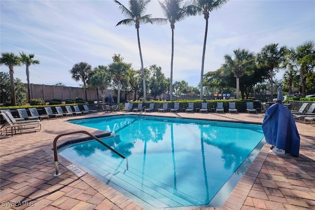 view of swimming pool featuring a patio