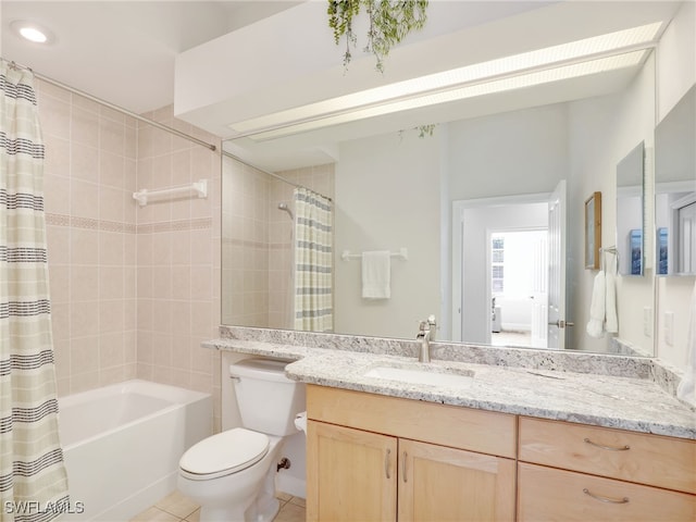 full bathroom featuring toilet, vanity, shower / bathtub combination with curtain, and tile patterned flooring