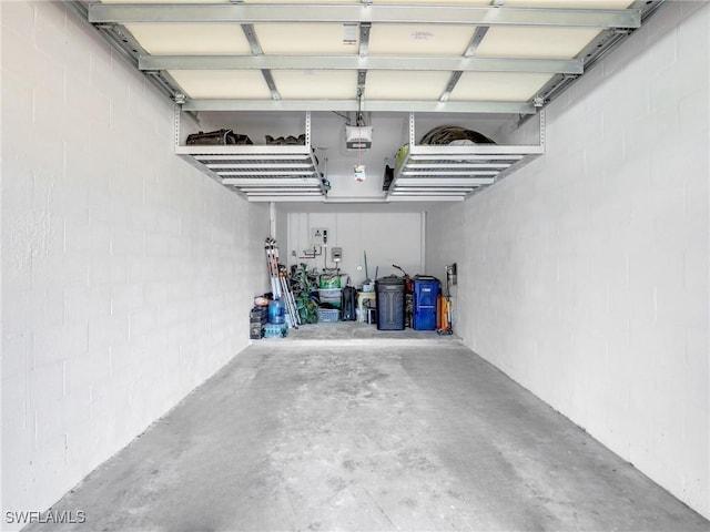 garage featuring a garage door opener