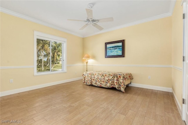 sitting room featuring light hardwood / wood-style flooring, ceiling fan, and crown molding