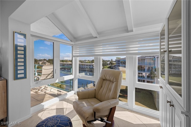 sunroom / solarium with vaulted ceiling with beams