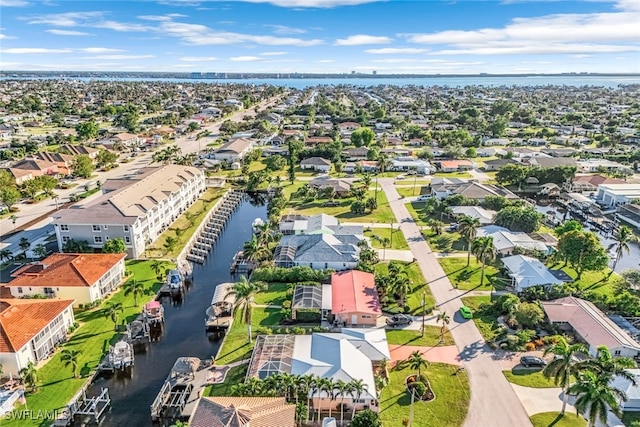 bird's eye view with a water view