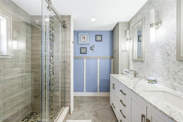 bathroom featuring vanity and walk in shower