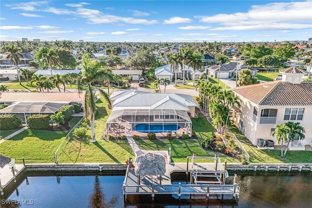 drone / aerial view with a water view