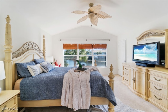 bedroom featuring light colored carpet, ceiling fan, and lofted ceiling