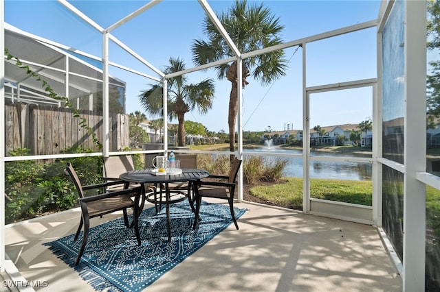 sunroom with a water view