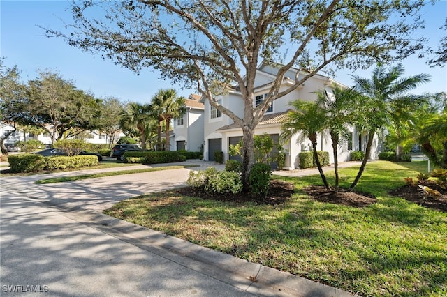 view of property's community with a yard