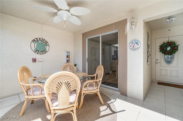 view of patio featuring ceiling fan