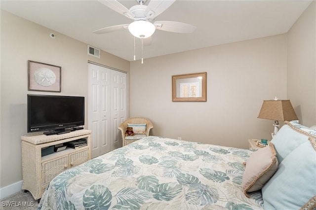 bedroom with carpet, a closet, and ceiling fan