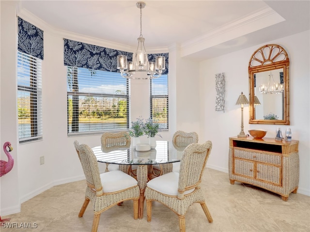 dining space featuring a notable chandelier, a healthy amount of sunlight, and crown molding