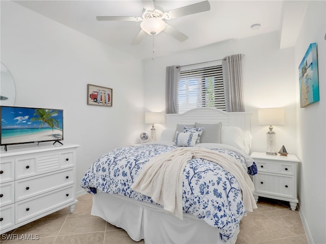 bedroom featuring light tile patterned floors and ceiling fan