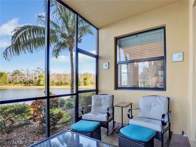 sunroom with a water view